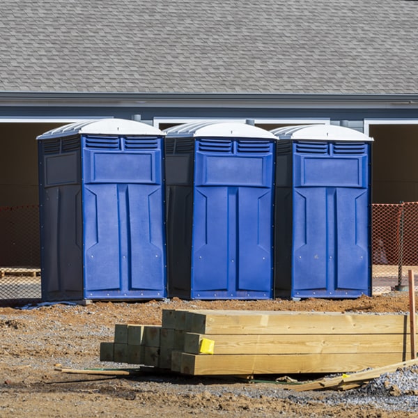 what is the cost difference between standard and deluxe portable toilet rentals in Collins